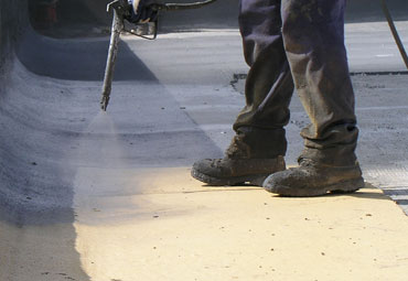 coating systems over Rockford spray foam roof systems